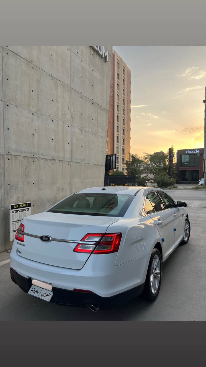 ‏  Ford taurus 2014 
‏       ✅ NIVA 
سەیارەکە یەک دەستە لە شەریکەوە 
  120 هەزار کم رۆشتوە 
دوو سویچ 
سفری نیڤا ، ناوزەرد ، سپی سادە ، دبڵ گێر ، ته حدید سورعە ، کۆدی درگا ، زینۆن ، لایت ئۆتۆ ، بەگلایت لید ، تەبرید مەرکەزی ، سوکان ڤۆلیۆم ، کوشن کارەبا ، ئاوێنە ناوچەی کوێر، ئاوێنە فۆتۆ ، دژە خلیسک ، حاسە، سپێری 
بێ بۆیاخ 
گێرومەکینە.....تەبرید بەشەرت....سەنەوی تازەیە....
سعرى 128$ معامه له 
ژ.م *********** السليمانية, العراق
