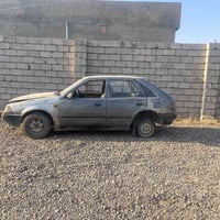 مازدا ٣٢٣ • مكينة كايم • قابل تفاوض