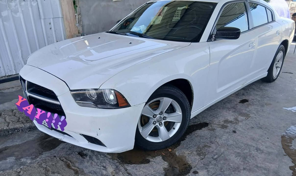 جارجر ٢٠١٤ SXT متومه نكليزي ادوات ادوات كصه جنطه محرك ٣٦٠٠ كير محرك تبريد ثلج جاهزه من كلشي عنوان بابل ٤٧ وبيهة مجال ***********@@
