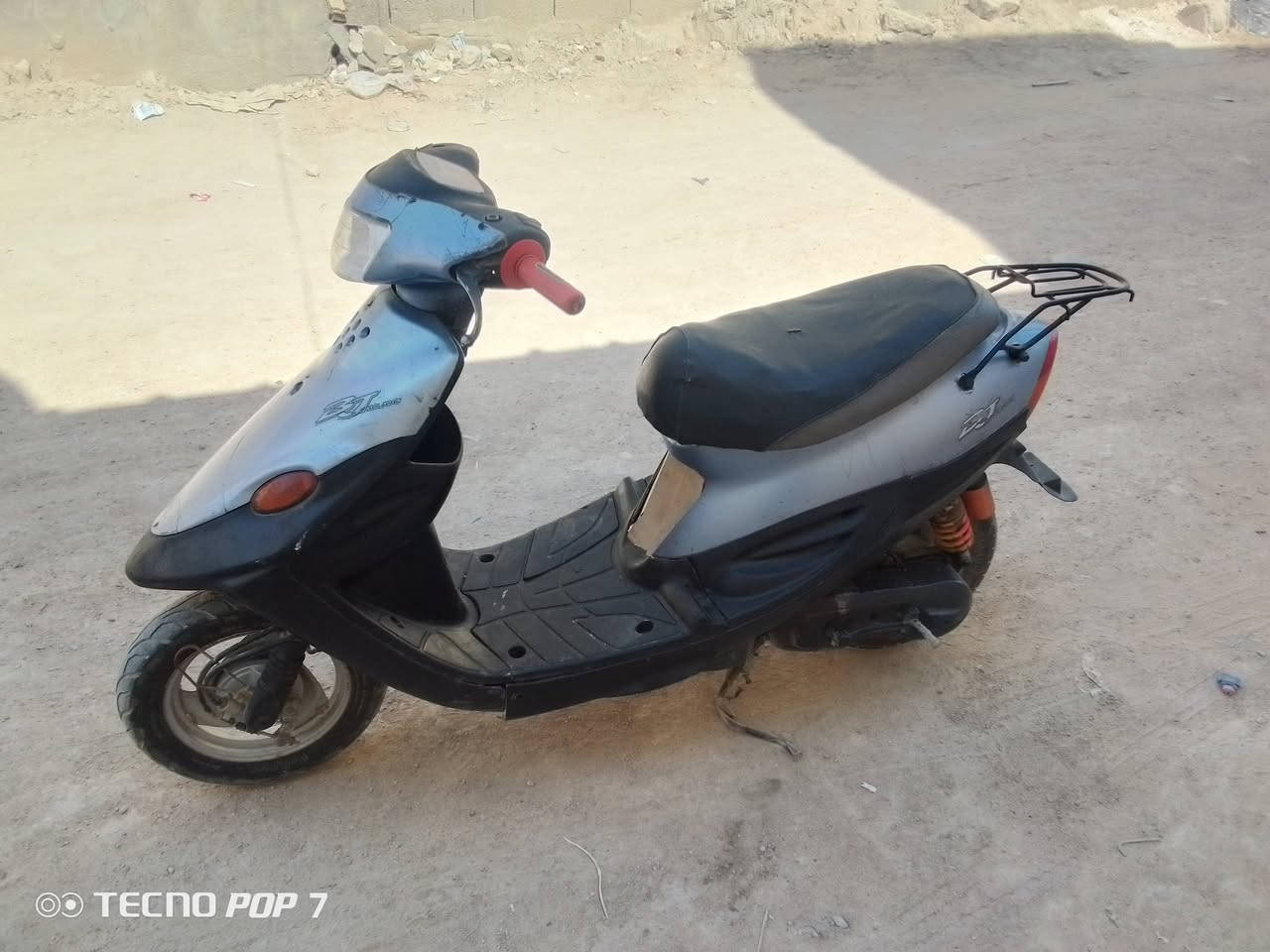 دراجه تسع زروف شغاله من كلشي كهربائيات وسحب قوي ونهضه قويه السعر 250 تشتغل بس هندر مكاني البصره المطيحه رقمي للتواصل ***********

نص مكتوب في الصور:
- TECNO POP 7
