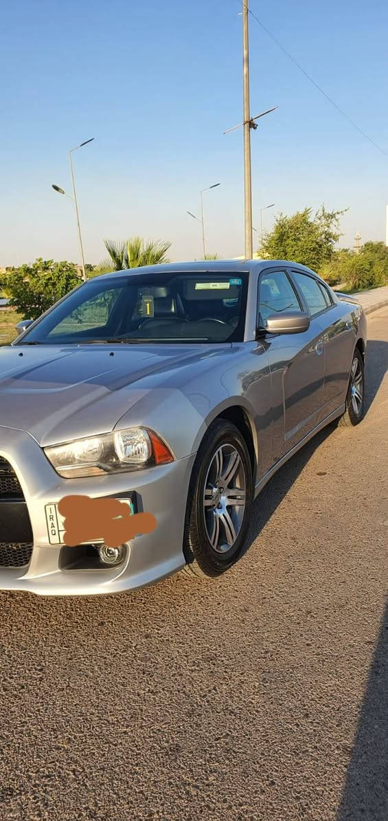 جارجر 2014وارد خليجي ما مشتغله خط رقم بغداد السونار مرفق مع الصور الاستفسار الاتصال عل رقم ***********

