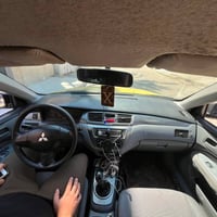 لانسر ٢٠١٠ • رقم ابيض • ضرر امامي