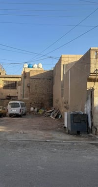 حي الجهاد الديوان • قطعة أرض ١٠٠م • طابو باسمي