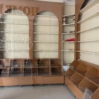 ديكور محل • إنارة داخلية • رفوف