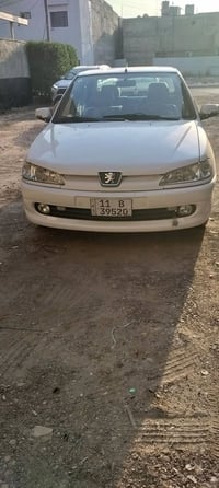 بيجو صدامي • ٢٠٠٢ • رقم بغداد