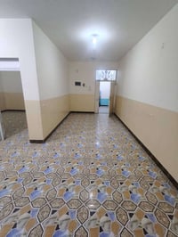 شقة طابق أول • غرفتين وصالة • حي السياسيين