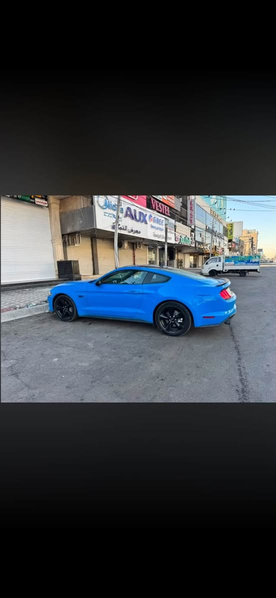 فورد موستنك GT 2023 🇺🇸
للبيع او المراوس حسب القناعه 
🔹 المواصفات الأمريكية
🔹 محرك 5.0 V8
🔹 ممشى 30 ألف كم فقط
🔹 لون أزرق مميز
🔹 لوحة بغداد خصوصي
🔹 مقاعد قماش

الإضافات:

* كورسا (CORSA Exhaust) بصوت رياضي مميز.
* فتح وإغلاق يدوي للصوت (Valve Control).
* السيارة جديدة ونظيفة جدًا وما ناقصها أي شيء

✅ مثبت سرعة
✅ كاميرا خلفية
✅ شاشة
✅ حساسات أمامية وخلفية
✅ مراقبة النقطة العمياء (Blind Spot)
✅ تحذير مغادرة المسار
✅ تحذير الاصطدام الأمامي
✅ نظام الثبات الإلكتروني (ESC)
✅ Apple CarPlay
✅ تشغيل عن بُعد
✅ إنارة LED
✅ مانع انزلاق
مكان السياره بغداد 
رقم ***********
