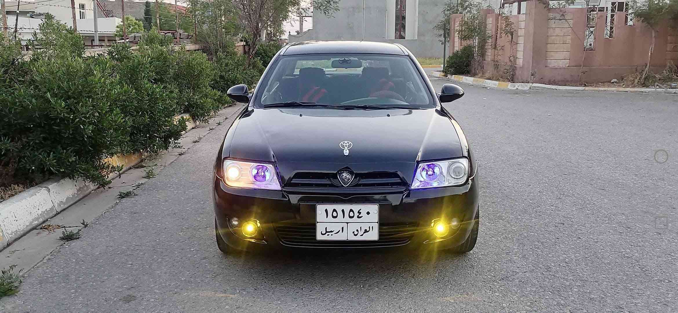 پرؤتؤن 2009 • گير عادى • شاشة بلوتوث