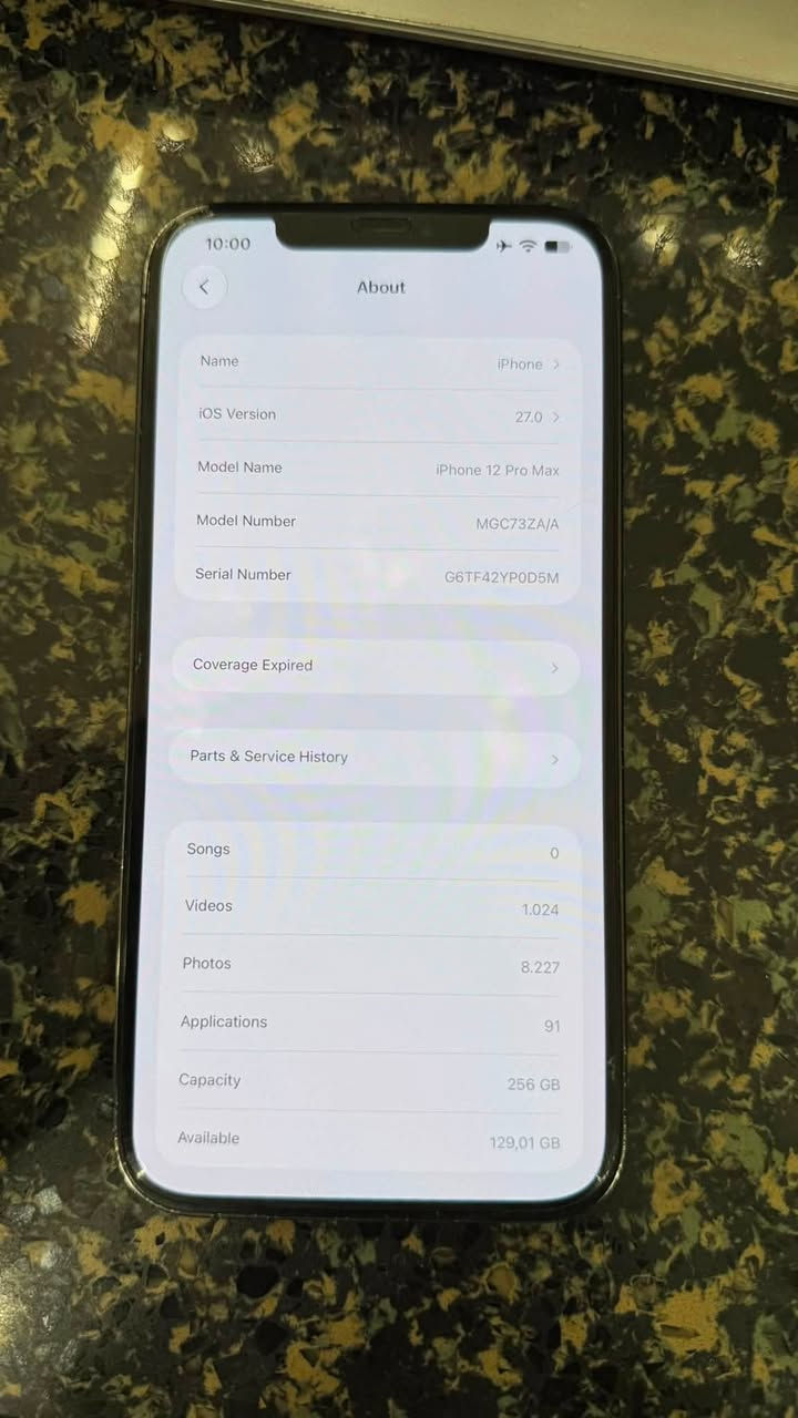 iPhone 12 pro max 
الجهاز ممفتوح ولا مصلح ولا شي 
ذاكره 256 
البطاريه 73 
بي مشكله الصوت ضعيف وفطر خفيف بالكامره الخلفيه 
كارتونه ويا كامله 
السعر قفل قفل قفل 350 
المكان كرادة داخل 
7717453741

نص مكتوب في الصور:
- 10:00 About Name iOS Version iPhone > Model Name 27.0 > Model Number iPhone 12 Pro Max Serial Number MGC73ZA/A G6TF42YP0D5M Coverage Expired Parts & Service History Songs Videos 0 Photos 1.024 Applications 8.227 Capacity 91 256 GB vailable 129,01 GB
- 10:00 Battery Health & Charging Important Battery Message The health of the battery in this iPhone has significantly degraded. An Apple Authorized Service Provider can replace the battery to restore full performance and capacity. Find Your Service Options Maximum Capacity %73 This is a measure of battery capacity relative to when it was new. Lower capacity may result in fewer hours of usage between charges. Peak Performance Capability Built-in dynamic software and hardware systems will help counter performance impacts that may be noticed as your iPhone battery chemically ages. Optimized Battery Charging To reduce battery aging, iPhone learns from your daily charging routine so it can wait to finish charging past %80 until you need to use it.
- 10:00 About Name iPhone > iOS Version 27.0 > Model Name iPhone 12 Pro Max Model Number MGC73ZA/A Serial Number G6TF42YPOD5M Coverage Expired > Parts & Service History > Songs 0 Videos 1.024 Photos 8.227 Applications 91 Capacity 256 GB Available 129,01 GB
