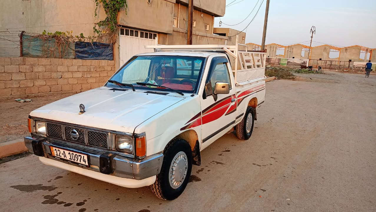 نيسان بيكم • ١٩٩٠ • محرك شرط