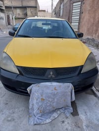 لانسر بومه • مكينة ٢٠٠٠ • انكليزي