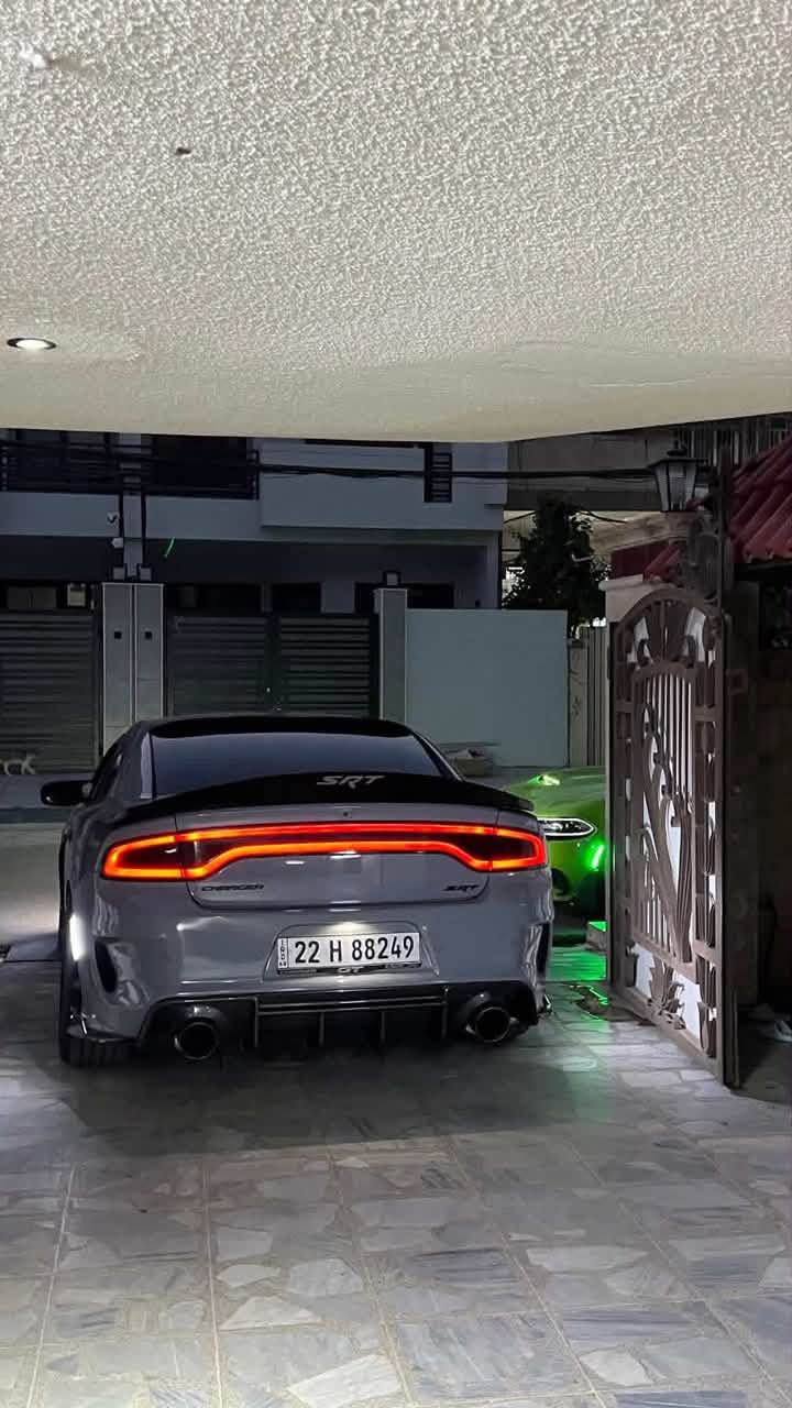 جارجر GT سوبر تراك باك 2022 رقم اربيل باسمي
نظافة فول وشرط احلى من الصور بيها جاملغين صبغ وربع البوند سعر 235 وبيها مجال مكاني الموصل 
***********

نص مكتوب في الصور:
- Dodge Charger Gt 2022 Light Blue 3.6L vin: 2C3CDXHG2NH176857 000-35845837-02/10/2023-IAA Inc. BidFax.info Final bid: $21200 Auction: IAAI SOLD Lot number: 35845837 Date of sale: 30.08.2023 Year: 2022 VIN: 2C3CDXHG2NH176857 Condition: Run and Drive Engine: 3.6L V6 24V VVT
- plc.auction