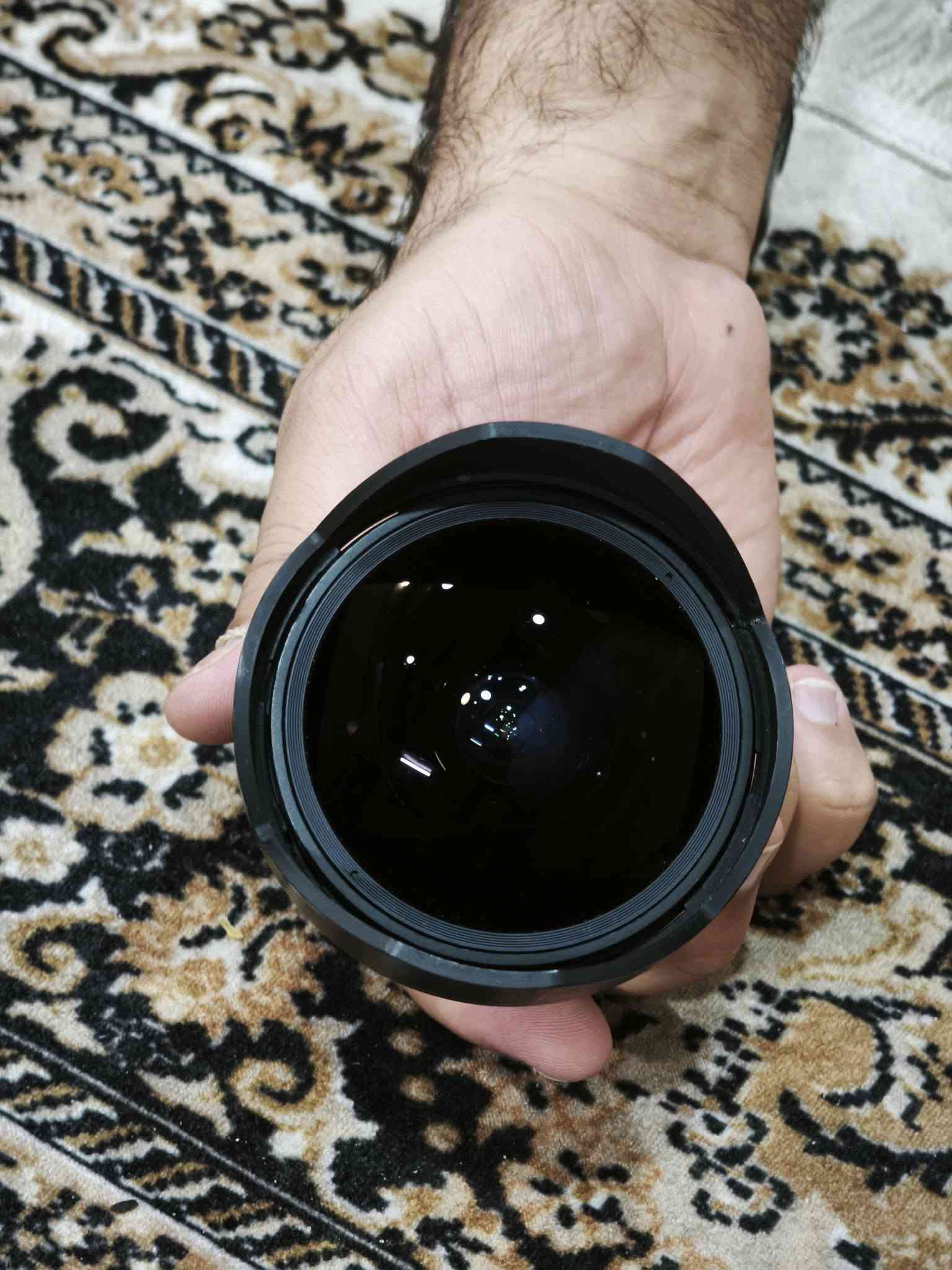 عدسة كانون • عين السمكة • مع الهود والغطاء