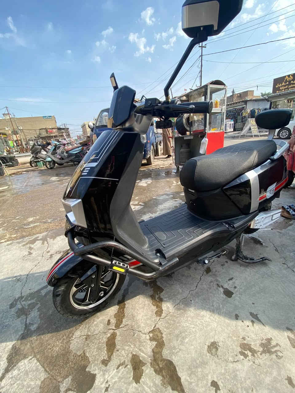 دراجة شحن • بطاريات مبدلة • شارع المطبك