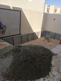 كربلاء • عمال بناء • رمل وسمنت
