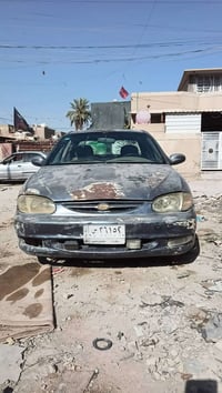 كيا سيفيه موديل 2001 السعر13 ورقه العنوان بغداد لامين الثانيه رقم الها...