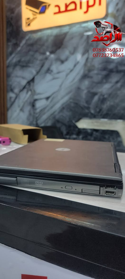 ديل D630 • منفذ COM • شاحن أصلي
