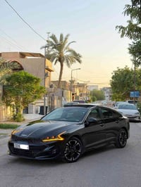 KIA K5 GT LINE 2024  كيا k5 2024 جيتي لاين فول 1/1 بغداد  ماشية 14 الف...