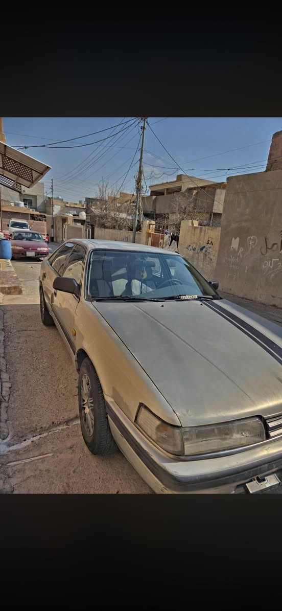 للبيع او مراوس بأحدث مازدا 626 موديل 1988 (طخم فول ونظافة مال بيت)
المحرك: 12 بخاخ (بشرط الفحص).

​الكير: أوتوماتيك (بشرط الفحص).

​التبريد والتدفئة: شغالين 100%.

​

​الداخلية: طخم بطاين أبواب جديد + كشن هيتر (تدفئة) للسائق.

​التحكم: تحكم ستيرن (أغاني) + بصمة تشغيل + تشغيل عن بُعد واطفاء عن بعد 

​التقنيات: شاشة وكاميرا خلفية + كيج قياس ضغط التايرات بالشاشة.

​الخارجية: لايت (عالي/ناصي/سكن) زينون + زوج تايرات جديد.

​الكهربائيات: كاملة وما محتاجة أي شغل.

​نشرة داخلية 12 لون تعمل 

بيها بعض النواقص البسيطة فقط 

​السيارة باسم ولد من الموصل سنوية عظم  لغاية 2027.

​السعر: اتصل على الرقم *********** او راسلني وتدلل
