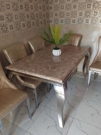 ٦ مقاعد • جلد درجة اولى • سطح مرمر