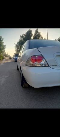 لانسر للبيع موديل 2006سياره حلوه ونضيفه تبريد ثلج اخوان مكلف بل نشر لل...