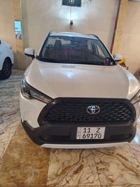 كورولا كروز 2025 رقم بغداد شاشه كبيره  أربعة كامرات فتحة سقف  حساسات ا...
