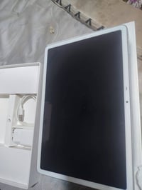 انفنكس XPAD • ١٢٨ • شاحن وكارتونه