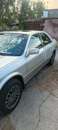 كامري للبيع موديل 2001 السعر 75 وبيهاا مجال 07805290194
