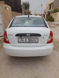 اكسنت 2010 • اوتوماتيك • باسمي