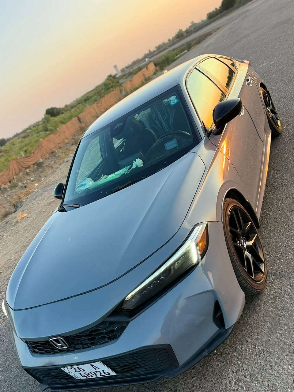 هوندا سيفيك SPORT 2025 🔥
130$ وبيها مجال بسيط

السلام عليكم ورحمة الله وبركاته 🌹

🚘 Honda Civic Sport 2025
💎 نظافة استثنائية – سيارة مال بيت

▪️ محرك 2.0 تنفس طبيعي
▪️ ماشية 45,000 كم
▪️ لوحات صلاح الدين إنجليزي 🇮🇶
▪️ استخدام شخصي ومال بيت
▪️ السيارة ما متعوبه نهائياً

   
* تنفس طبيعي
* DOHC، 16 صمام
* Dual VTC
* حقن مباشر للوقود
* القوة: 150 حصان
* العزم: 133 lb-ft ≈ 180 نيوتن.م
* دفع أمامي FWD
* أوضاع قيادة: ECON / Normal / Sport
* بدالات تبديل خلف المقود Paddle Shifters
* تشغيل عن بُعد للمحرك
* نظام إيقاف/تشغيل المحرك Idle Stop 

الخارجية

* جنوط ألمنيوم رياضية 18 إنج Gloss Black
* إطارات 235/40 R18
* مرايا جانبية كهربائية بلون أسود لامع ومدفأة
* Smart Entry
* قفل تلقائي عند الابتعاد عن السيارة
* عادم بتشطيب كروم
* تصميم Sport خارجي رياضي 

الداخلية والراحة

* مقاعد Combination
* دركسون مغلف بالجلد
* مقبض جير مغلف بالجلد
* دواسات رياضية Sport Pedals
* مسند ذراع خلفي
* المقاعد الخلفية قابلة للطي 60/40
* تشغيل بصمة/زر Push Button Start
* فرامل يد كهربائية مع Auto Hold
* Hill Start Assist 

الشاشة والترفيه

* شاشة لمس ملونة 7 إنج
* شاشة معلومات للسائق 7 إنج TFT
* Apple CarPlay
* Android Auto
* Bluetooth
* نظام صوتي 180 واط
* USB-C
* منفذ 12V 

الأمان

* Honda Sensing
* نظام فرملة لتخفيف الاصطدام CMBS
* تحذير الاصطدام الأمامي FCW
* تحذير مغادرة المسار LDW
* نظام المساعدة على البقاء/الحد من الخروج عن الطريق RDM
* كاميرا خلفية
* Blind Spot Information System
* Cross Traffic Monitor
* ABS
* ثبات إلكتروني
* وسائد هوائية أمامية وجانبية وستائرية
* مراقبة ضغط الإطارات TPMS 

🛠️ الحادث:
تبديل قطعتين فقط، شرط بدون اي دواخل.

✅ مكينه گير شواصي والكهربائيات كلها مكفولة.

⭐ سيارة مرتبة ونظيفة جداً، استخدام بيت، وبحالة ممتازة.
⭐ المعاينة خير دليل على نظافتها وحالتها.

📞 للاتصال: [‭***********‬]

