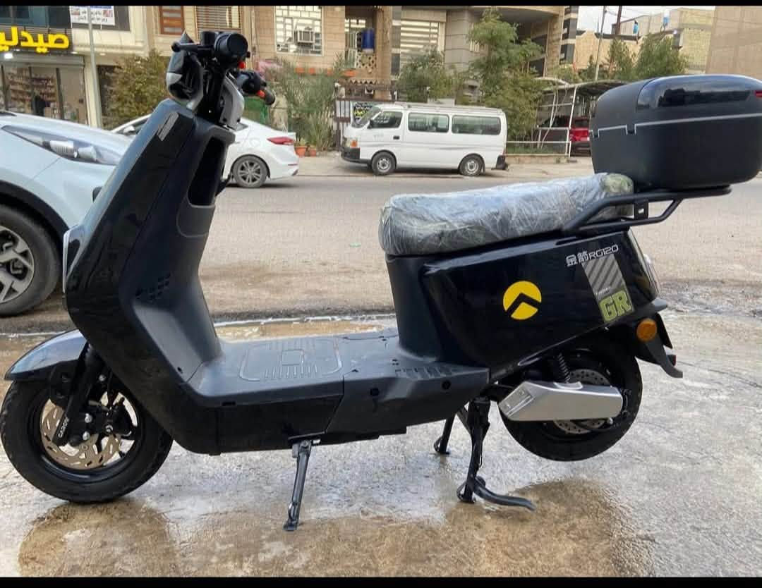 السلام عليكم دراجه شحن لبيع  ماشيه 19 كيلو الدراجه نضيفه السعر خاص *********** المكان بغداد تجي بصمتين ومرايات وصندوك ليوره
