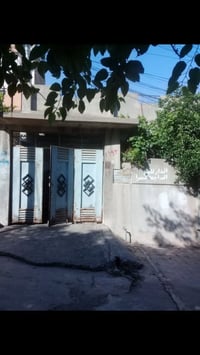 دار للبيع  الموقع حي العامل خلف مديرية الإشراف التربوي مساحة 200 متر غ...