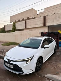 2025 كورلا هايبرد شكل لامريكي للبيع بصمه تشغيل بصمه ابواب فتحه سقف قطع...