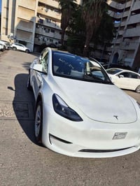 تسلا y دبل ماطور 2024 اون لاين ماشيه اقل من 10الف ميل رقم بغداد بسمي ح...