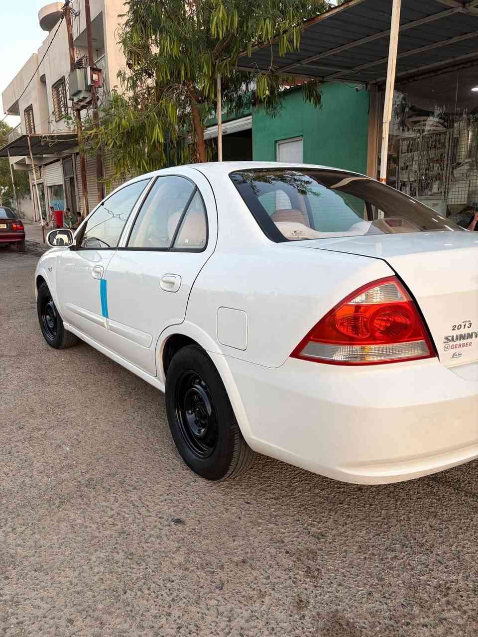 نيسان صني 2013 أبيض ثلجي كير اوتوماتيك سنوية جديد 2031+بطاقة بنزين بدون صبغ بدون تبديل بيها بارد وملاحظات صونارها مرفق بالمنشور سعر 107 وبيها مجال *********** عنوان كركوك الحرية....
