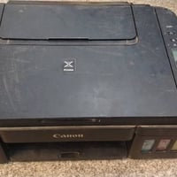 طابعة كانون g2411 شغالة كهرباء كاملة بس نقصها فقط كاترجات سعرهة 35الف ...
