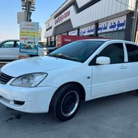لانسر • ٢٠١١ • اوتوماتيك