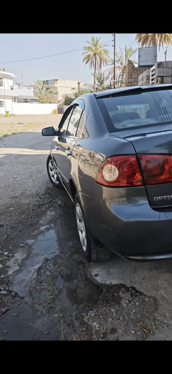 السلام عليكم 
كيا اوبتيما موديل 2008 
مكينه 2400 دوشش
بيها بارد بالچامرلغ الخلفي بدون معجون 
تبريد ثلجج 
السعر المطلوب 98 وبيها مجال
مكان السيارة ديالى-بعقوبه
الرقم 
(***********)
