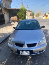 لانسر ٢٠٠٧ • أربيل • مكينة وكير
