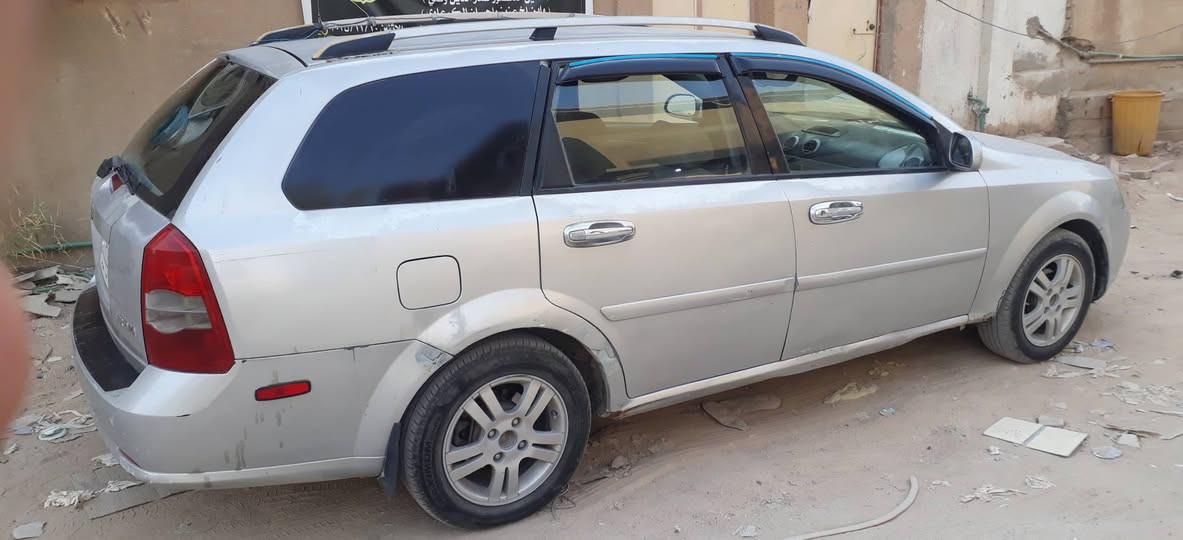سازوكي فورنزا 2006 سنوية 2028
اللون فضي ، الداخل رصاصي 
محرك 2000 جيد ان شاء الله تعالى
گير فوق المتوسط 
تبريد حقيقة ثلج بس يحتاج اله كهربائي
السنوية باسمي وامداور مباشر
تخم تايرات جديد
بيها بعض الطخات البسيطة
صبغ حزام 
السعر مستعجل  45 $ ورقة 
سيارة رقمها نجف 
رقم الهاتف ***********
