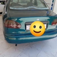 دايو لانوس موديل 2002 لون  زيتوني كير اوتماتيك  محرك وكير مكفول  مصبوغ...