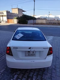 ٢٠٠٤ • باسمي • مضروب ٥ قطع