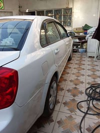 اوبتره 2012 محرك وكير ممتاز تبريد سياره جاهزه بغداد مبايل 07753880255 ...