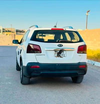 سورنتو 2011 محرك 2400 رقم بغداد  السعر 125وبيها مجال  07818490380