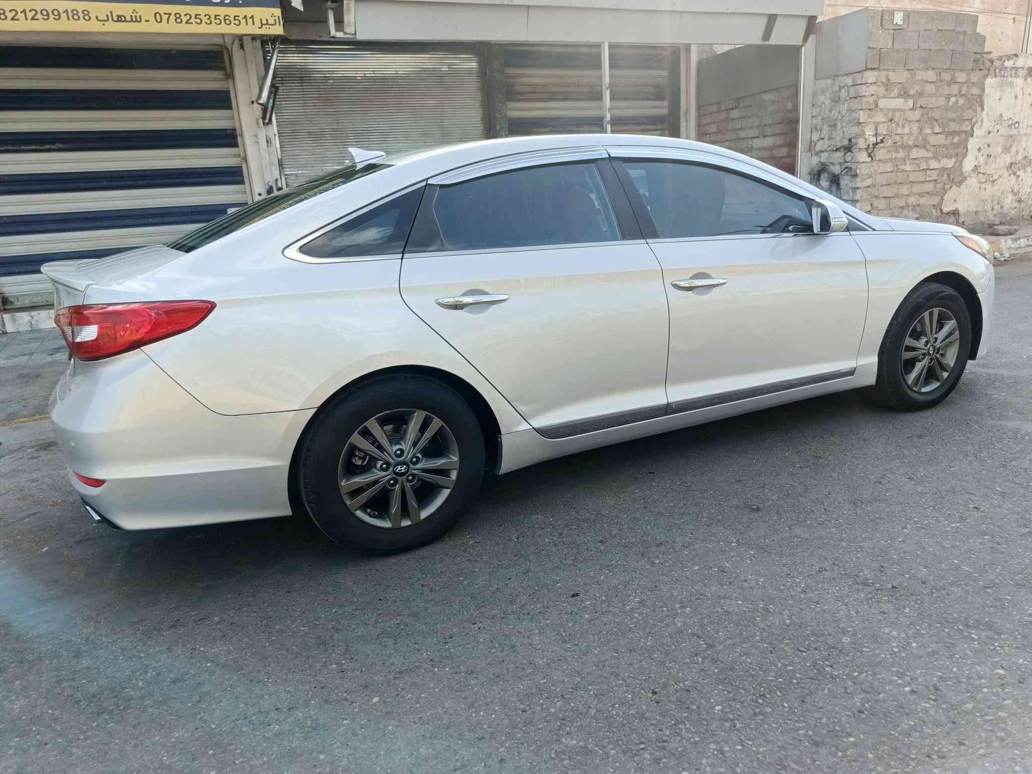 سوناته امريكي كلين 
فقط صبغ قطعتين
 ارقام بغداد باسمي
 محرك معلايه كازكيت كير حداديه كشر مكفول 
لايت زنون هورن بوش 
مابيها كل نقص مال جناي جاهزه كبل لشارع 
مكاني رمادي التاميم 
السعر ١١٥ ورقه وبيها مجال بسيط 
الاستفسار ***********

نص مكتوب في الصور:
- اثير *********** - شهاب 821299188
