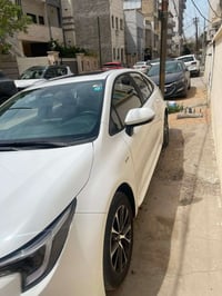 كورلا هايبرد موديل ٢٠٢٥ السيارة ماشية ٢٠ الف اخذتها زيرو جديدة رقم بغد...