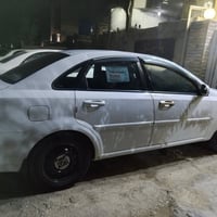 اوبترا موديل 2011 بيها جاملغ امامي مبدل وشويه صبغ بالجاملغ الخلفي بدون...