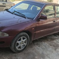 بروتون ويره 2005سياره نضيفه اتوماتيك رقمه بغداد اسعر 45رقم 07731190642