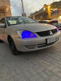 لانسر ٢٠١١ • مصبوغه • بدون ضربه