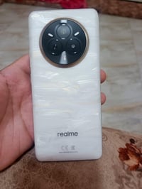 عندي تلفون للبيع مع كامل ملحقاته مستعمل شهر ريلمي 14برو اخو جديد سبب ا...